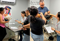 Investigadoras realizando mediciones a mascotas